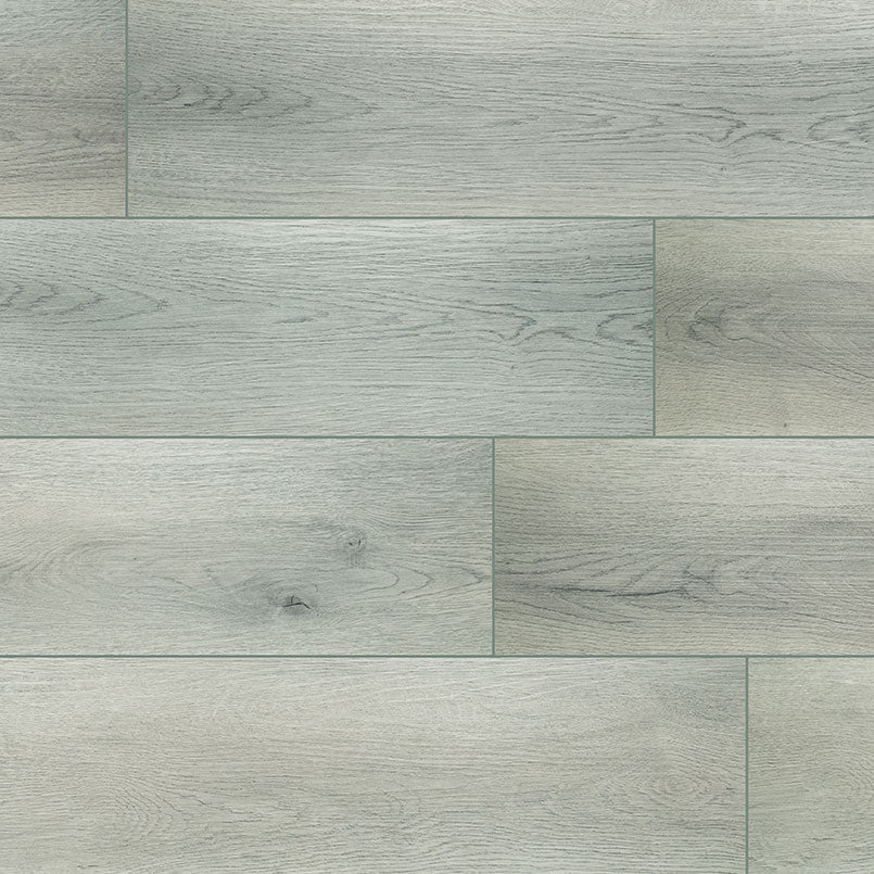 MSI XL Cyrus Kardigan Luxury Vinyl Planks feature light gray tones, natural wood grain, and knots. The waterproof, rigid core construction ensures durability and style—each box covers 22.44 SQFT for a modern look in any space.